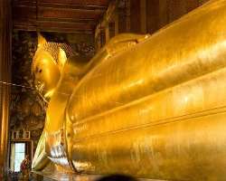 The large statue of Reclining Buddha is about 15 meters high and 46 meters long. The whole body of the statue is gold plates and Mother-of-Pearl or Na